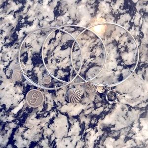 Alex and Ani silver bracelets. Can get all three or just one if interested.